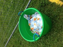 Bucket of mini tarps (photo: Rebecca Webster)